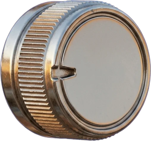 The chrome knob with its knurled edge and one worn notch